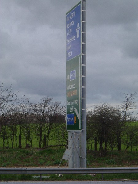 Road sign indicating change to motorway <u>North</u> of Spital Gap lane